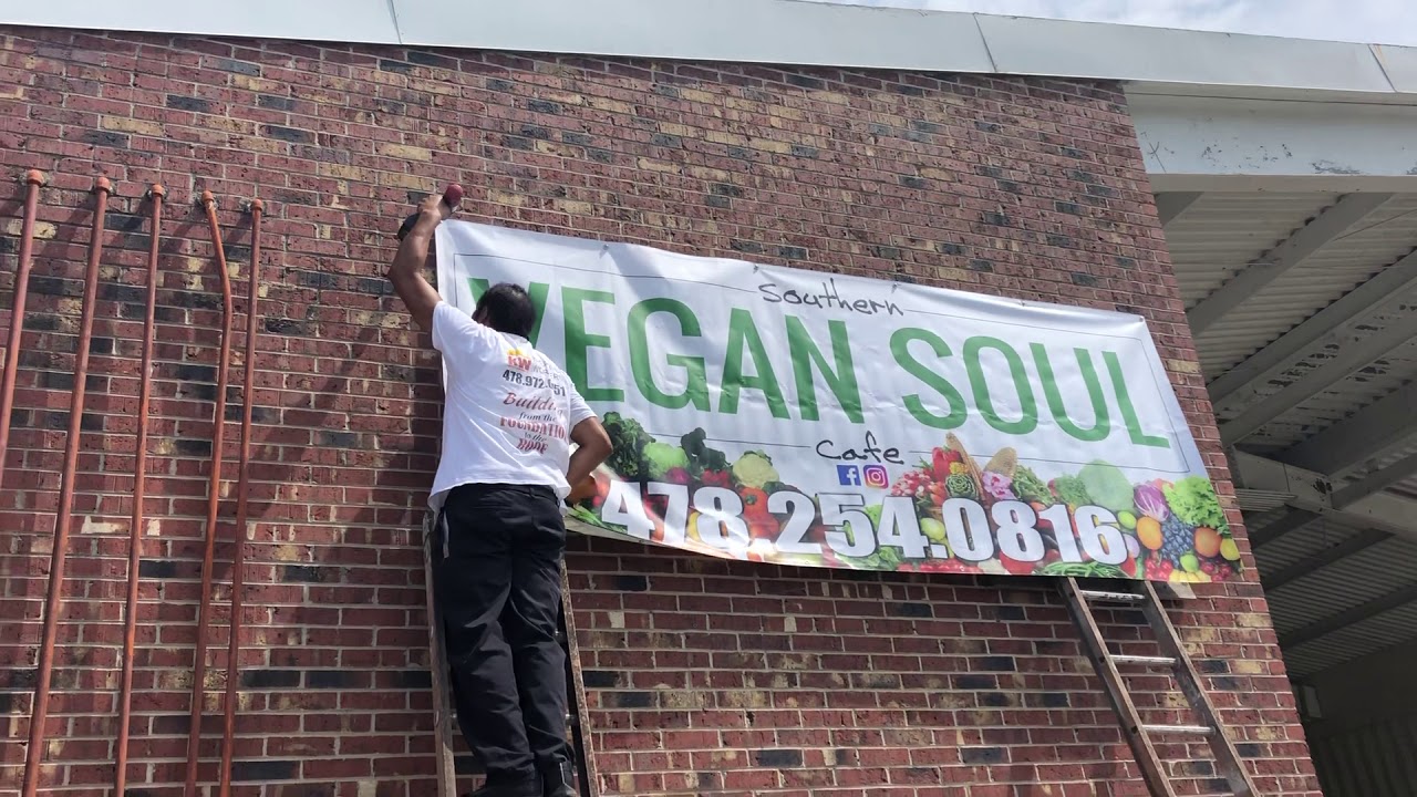 A Banner Installation On Brick Wall YouTube