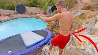 CATAPULTING TRAMPOLINE SLIP N SLIDE INTO POOL!