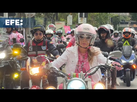 Venezuelans hold a caravan through Caracas to raise funds for breast cancer awareness