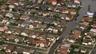 Live: Heavy rain causes flooding in Huntington Beach