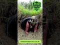 Muddy crawl through tunnel