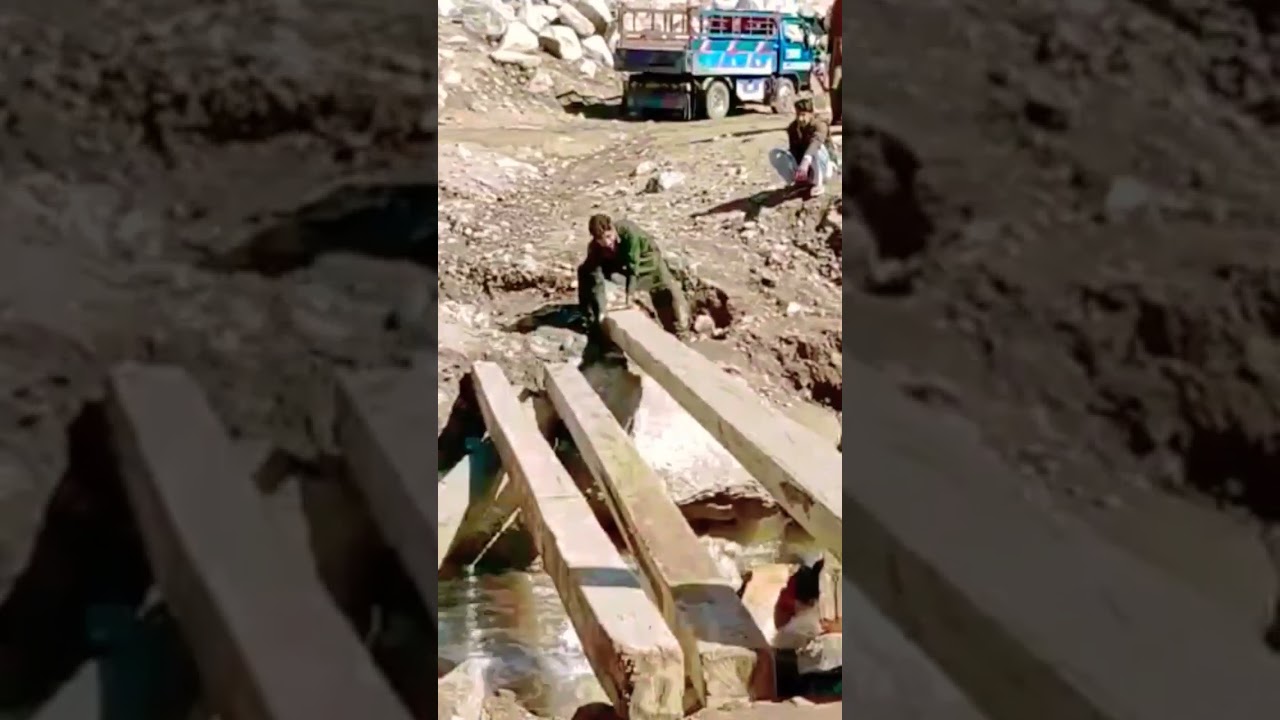 Locals repairing flood  demged roads, bridges at Doogdarra Upper Dir