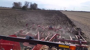 Val driving 550 Quad Trac chisel plowing.