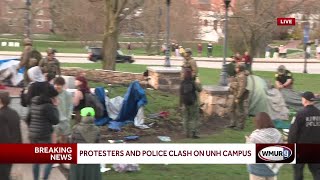 Police taking protestors into custody at University of New Hampshire