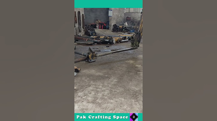 The Process Of Unscrewing A Large Nut With A Crane