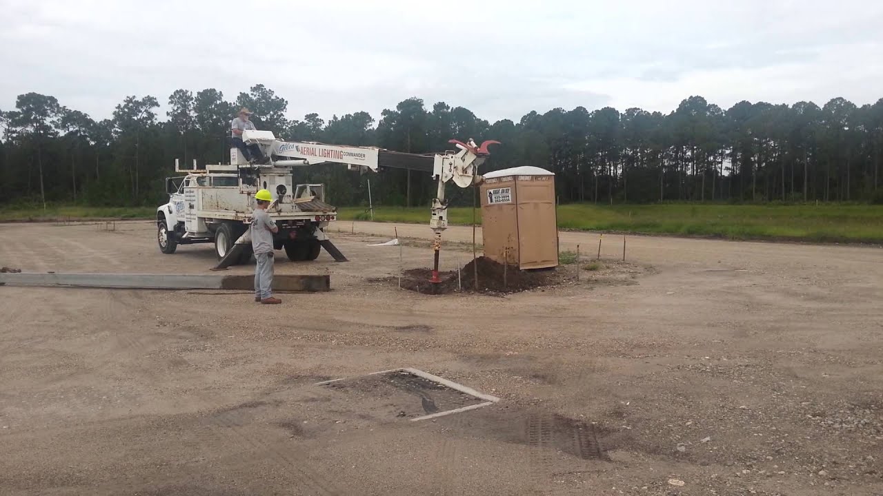 Drilling light pole holes YouTube