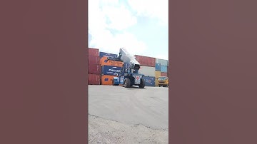 Kalmar Reach stacker with a tilting spreader for container handling