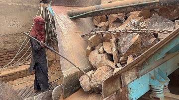 "Stone Crusher Machine: A Giant at Work"The Power of Stone: Machine Working in Action"#stonecrusher