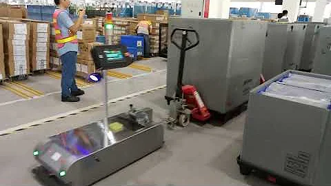 Tugger AGV Automated Guided Vehicle towing forklift truck