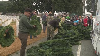 Volunteers Place Wreaths Near Headstones to Honor our Fallen Heroes