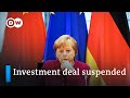 EU suspends investment deal with China over 'retaliatory sanctions' | DW News
