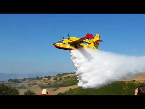 Fire fighting planes and helicopters in Italy, canadair CL-415 and Hughes-MD500 antincendio boschivo
