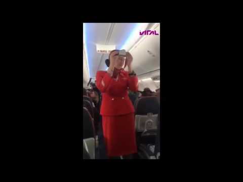 funny:-football-fans-distract-air-hostess-doing-safety-announcement-just-for-laughs