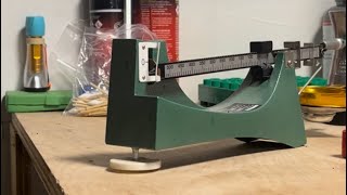 How to use a balance beam powder scale quickly and consistently