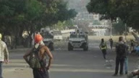 Venezuelan protesters clash with National Guardsmen