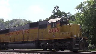 A UP SD60 leads NS 24Q past Shen