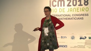 Symmetry and symmetry breaking: Rigidity and flows in elliptic PDEs – Maria Esteban – ICM2018