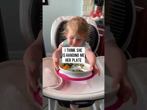 She’s VERY into her napkin lately!