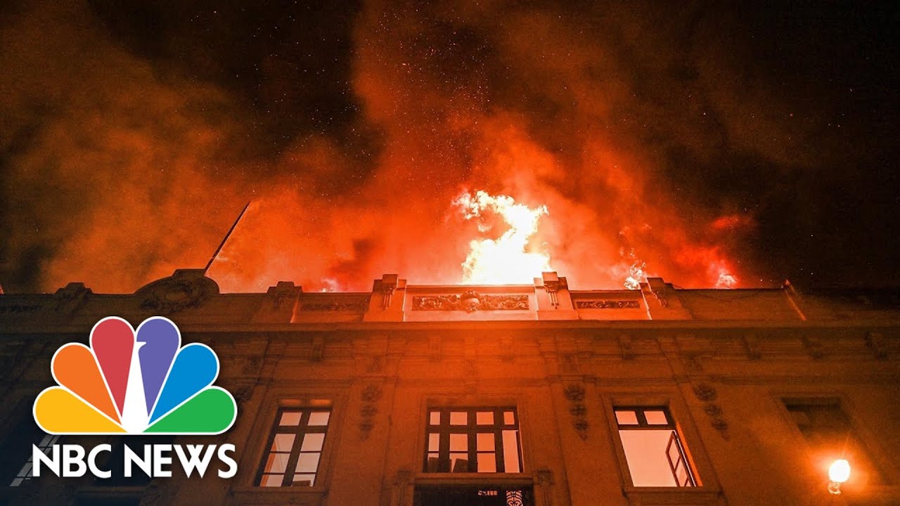 Historic building burns in Lima after anti-government protests rock city