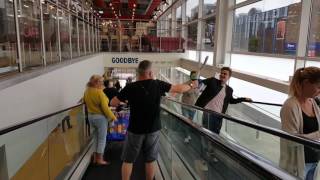 Sword fight on escalator.
