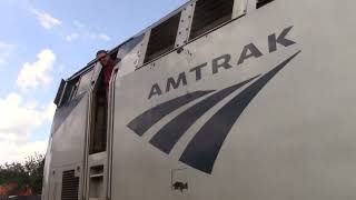 MVI 0075 amtrak P051 with a happy engineer & an saahc in alexandria va