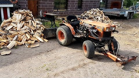 Making firewood with a axe and log splitter machine 2018.