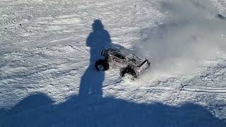 Traxxas Xmaxx paddle tires in the snow
