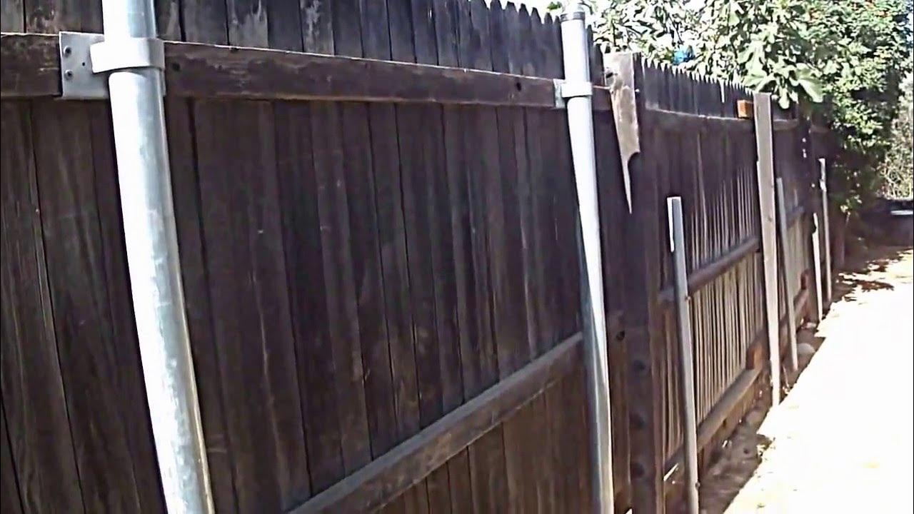 Wood Fence With Round Galvanized Steel Posts And Brackets - Youtube