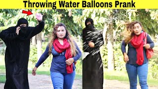 Throwing Ice Water Balloons at Peoples Prank | @HitPranks