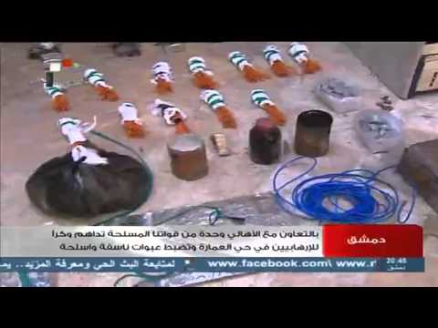   دمشق بالتعاون مع الأهالي وحدةمن قواتنا المسلحة تداهم وكرا للإرهابيين في حي العمارة