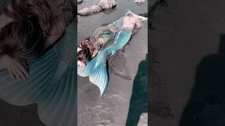 Two mermaids washed up in a net on the beach realmermaid mermaidtails mermaid imadethis