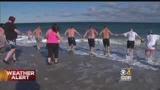 Marshfield Residents Swim, Run On Frigid New Year's Day
