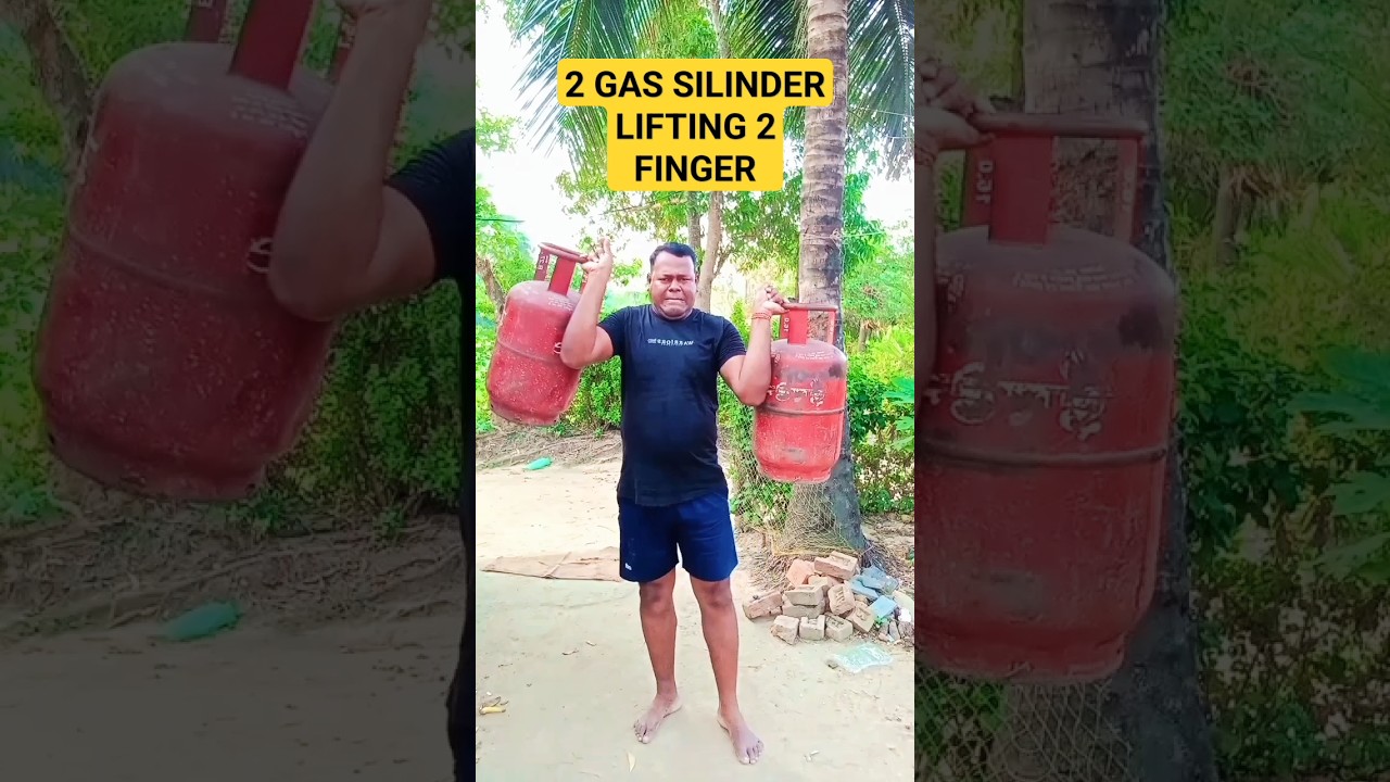 Indian Desi Man  Lifting 2 Silinder  with Little Finger 