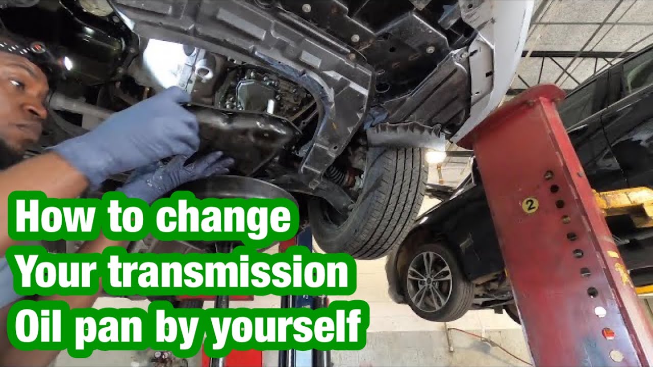Replacing transmission oil pan on a Nissan Sentra - YouTube