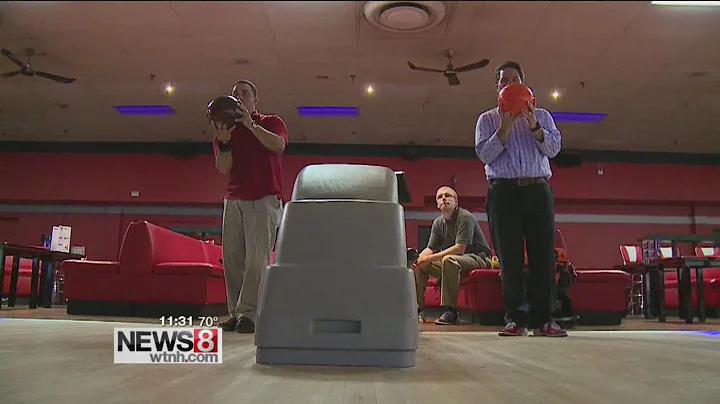 Meteorologist Kevin Arnone shows off his mad bowli...