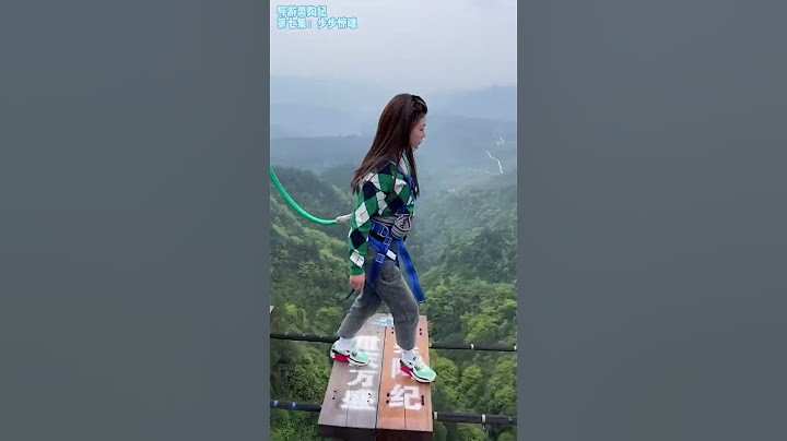 Bungee Jumping With Rope In Beautiful Place,Girl Walks Briskly On The Aerial Rope Bridge#extreme