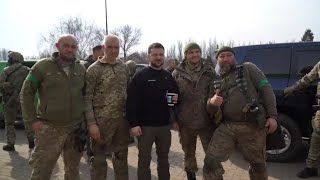 Zelenskiy drinks coffee at east Ukraine gas station, takes selfies with soldiers