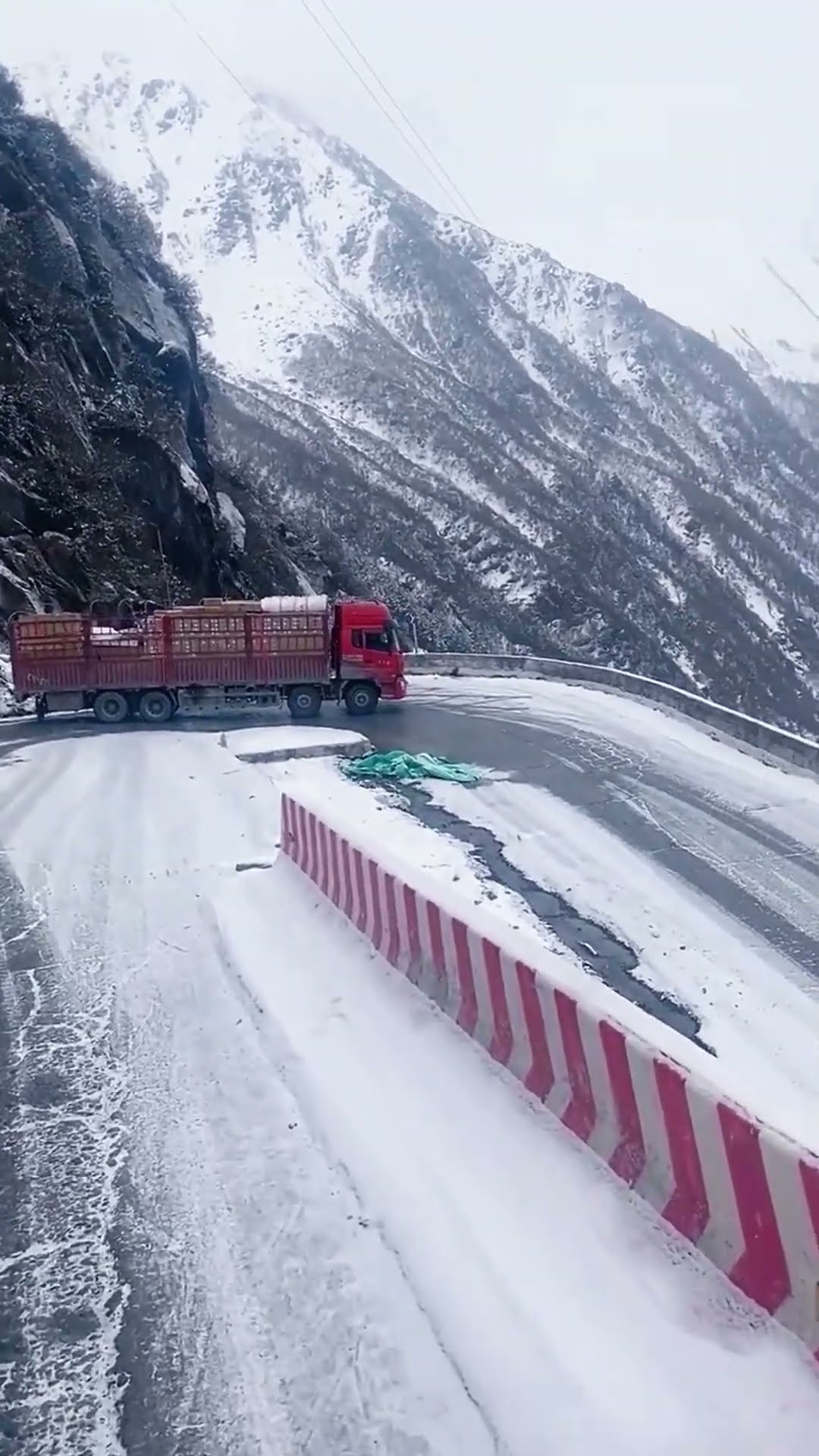 The truck went downhill through snow and ice
