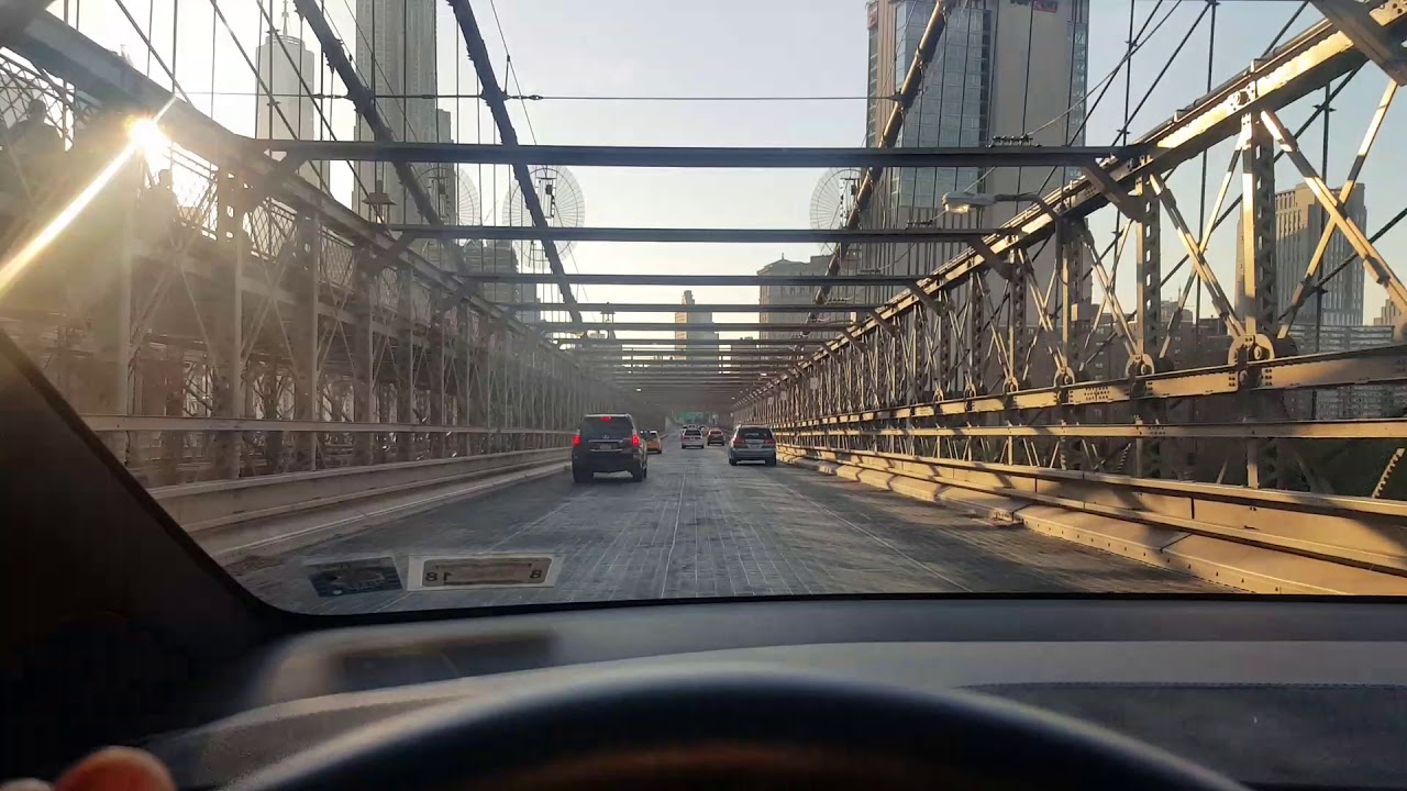 Tesla Model X p100d over the Brooklyn Bridge