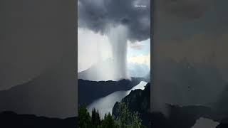 انفجار سحابة المطر فوق بحيرة ميلستات في النمسا 🌧️ - A rain cloud explodes over a lake in Austria