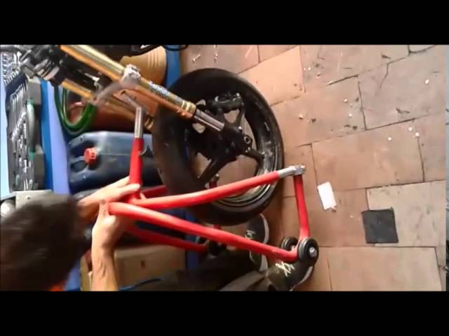 video caballete tija para moto -