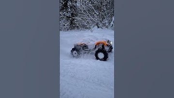 TRAXXAS X MAXX 8S deep snow bash, super slow motion, LED light kit, paddle tires.