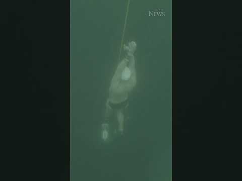 This was a record-breaking freedive under a frozen lake in Switzerland #shorts #news