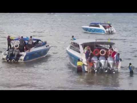 Speedboat stuck on sandbar