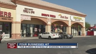 Officials search for two suspects in string of armed robberies