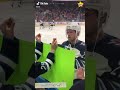 Nikolaj Ehlers of the Winnipeg Jets trades a hockey puck for a package of Tic Tacs