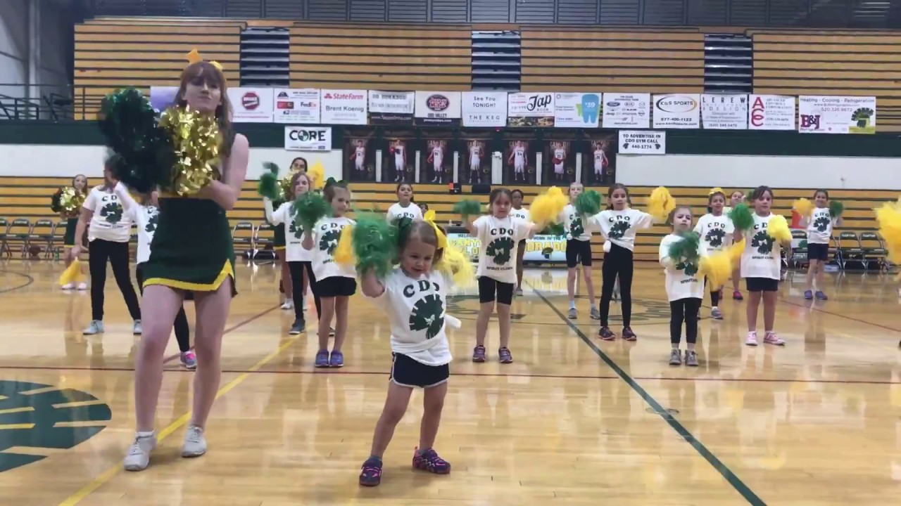 Cutest Little Cheerleader Dancing with the Cheer Squad. Little Girl
