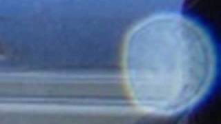 Orb with ghost child face