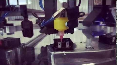 Automated glue dispensing, UV curing, defect detection and placing to the box system