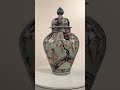 A rare pair of early Edo period Imari vases and covers